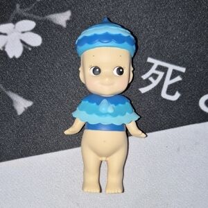 Blue and Cream Kids Toy Figure